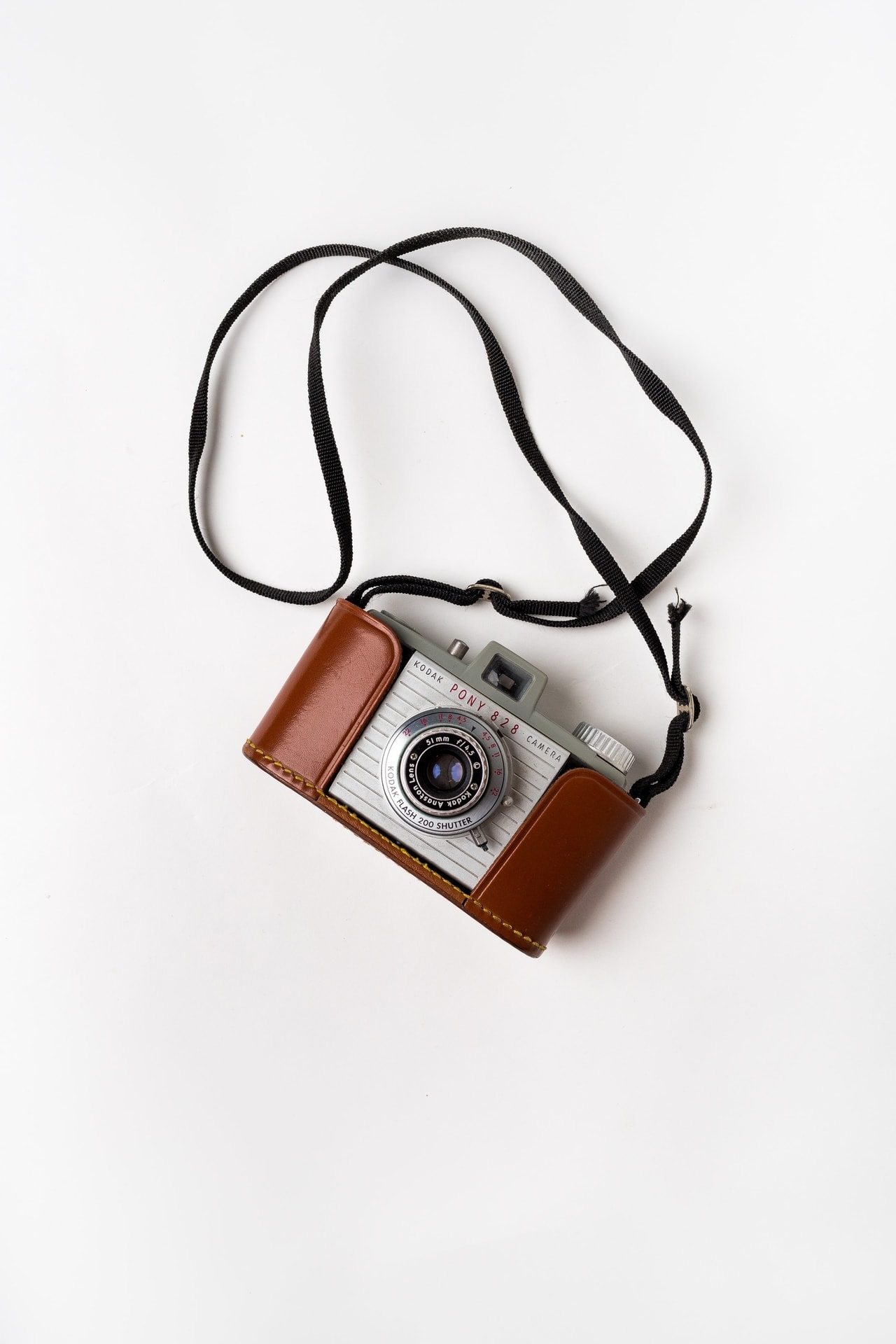 Kamera Vintage kodak fotokamera med skinnskjede og stropp